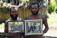 Vanuatuans with their pictures of Prince Philip