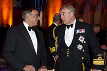 The Duke of York with the US Secretary of Defense Leon Panetta commemorating 100th anniversary of Naval Aviation at the National Building Museum in 2011.