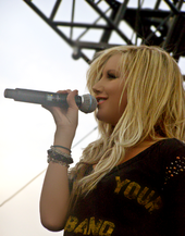 Tisdale performing at the opening of the first Microsoft Store in Scottsdale, Arizona, in October 2009