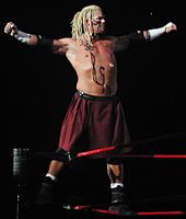 Raven competing for WWE in September 2002.