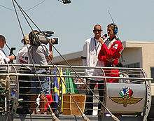 Miller waves the green flag at the 2005 Indy 500, days after his final game with the Pacers