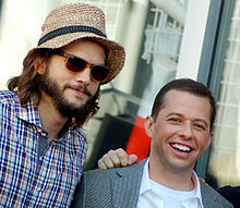Kutcher with Two and a Half Men co-star Jon Cryer in September 2011