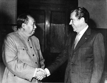 President Nixon greets Chinese Communist Party Chairman Mao Zedong (left) in a historic visit to the People's Republic of China, 1972.