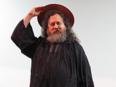 Richard Stallman gets into his St. iGNUcius avatar at Techniche, IIT Guwahati, India