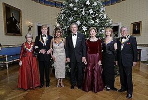 U.S. President George W. Bush and First Lady Laura Bush pose with the Kennedy Center honorees, from left to right, Julie Harris, actor Robert Redford, singer Tina Turner, ballet dancer Suzanne Farrell and singer Tony Bennett on December 4, 2005, during the reception in the Blue Room at the White House.