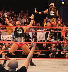 Beer Money as TNA World Tag Team Champions.
