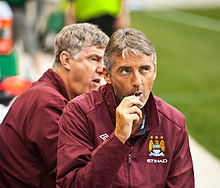Mancini as Manchester City manager in July 2010 during a pre-season match.