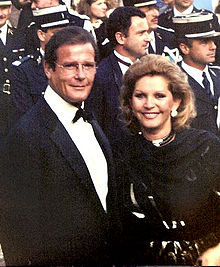 Roger Moore at the 1989 Cannes Film Festival with wife Luisa Mattioli.