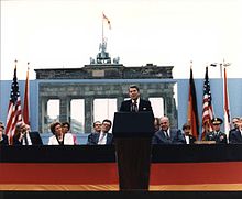 Ronald Reagan speaks at the Berlin Wall's Brandenburg Gate, challenging Gorbachev to "tear down this wall!!"