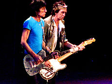 Wood (left) with Keith Richards (right) as an official Rolling Stone