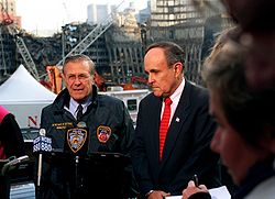 Donald Rumsfeld and Rudy Giuliani at the site of the World Trade Center, on November 14, 2001.