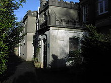 Kipling's house in Torbay, Devon, with an English heritage blue plaque on the wall