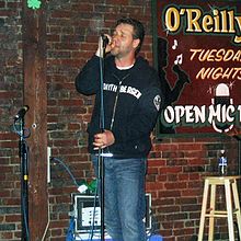 Crowe singing on open mic at O'Reilly's Pub in St. John's, Canada. 13 June 2005