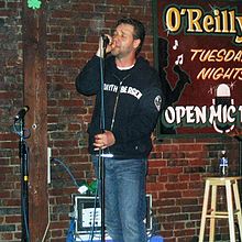 Crowe singing on open mic at O'Reilly's Pub in St. John's, Canada. 13 June 2005