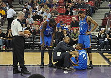 Russell Westbrook being treated by trainers
