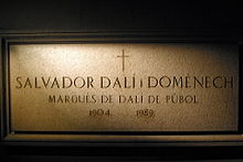 Dalí's crypt at the Dalí Theatre and Museum in Figueres, stating his title