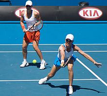 Stosur (left) with doubles partner Rennae Stubbs at 2009 Australian Open