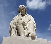 Statue of Dr. Johnson erected in 1838 opposite the house where he was born at Lichfield's Market Square. There are also statues of him in London and Uttoxeter.[225]