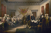 In John Trumbull's Declaration of Independence, Adams is seated to the viewer's right of Richard Henry Lee, whose legs are crossed in the front row.[168]