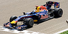 Vettel driving for Red Bull Racing at the 2010 Bahrain Grand Prix, where he took the first pole position of the season