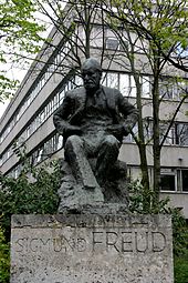 Sigmund Freud memorial in Hampstead, North London. The statue is located near to where Sigmund and Anna Freud lived. The building behind the statue is the Tavistock Clinic, a major psychological health care institution.