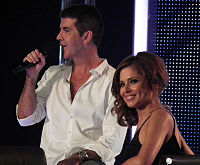 Cowell alongside Cheryl Cole as judges on The X Factor UK's series seventh.