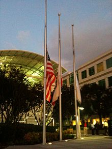 Flags flying at half-staff outside Apple HQ in Cupertino, on the evening of Steve Jobs's death.