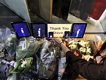 Memorial candles and iPads to Steve Jobs outside the Apple Store in Palo Alto California shortly after his death