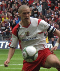 Morison captaining Stevenage.