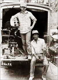 Steven Spielberg and Chandran Rutnam on a location in Sri Lanka during the filming of Indiana Jones and the Temple of Doom.