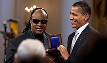 Wonder is presented the Gershwin Award for Lifetime Achievement by United States president Barack Obama.