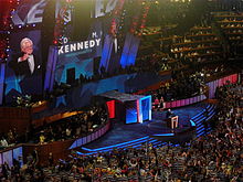 Kennedy speaks during the first night of the 2008 Democratic National Convention in Denver, Colorado, while delegates hold signs reading "KENNEDY"