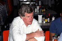Senator Kennedy talking to sailors aboard USS Theodore Roosevelt, February 1987