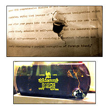 The bullet-damaged speech and eyeglass case on display at the Theodore Roosevelt Birthplace