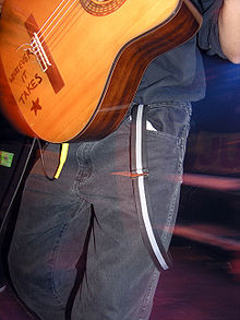 "Whatever It takes", a classical acoustic guitar used by Morello in his The Nightwatchman persona.