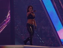 Stratus performing her entrance at WrestleMania XXVII