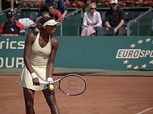 Venus Williams prepares to serve during the 2006 J&S Cup in Warsaw