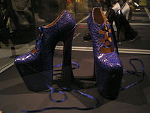 The pair of heels designed by Westwood in which Naomi Campbell famously stumbled while modelling at Westwood's fashion show in 1993[8]