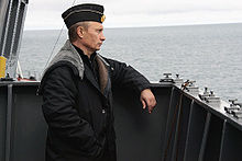 Putin aboard the battlecruiser Pyotr Velikiy during the Northern Fleet manoeuvres in the Barents Sea, 2005.