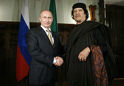 Putin meeting with Colonel Muammar Gaddafi in 2008.