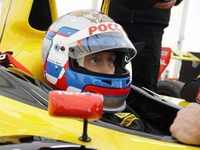 Putin driving a Formula 1 car, 2010 (see the video).