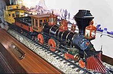 The Lilly Belle on display at Disneyland Main Station in 1993. The caboose's woodwork was done entirely by Walt himself.