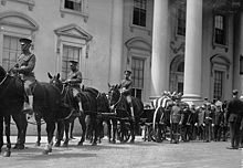Funeral procession for President Harding passes by the front of the White House