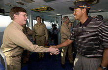 Woods visiting aircraft carrier USS George Washington in the Persian Gulf before participating in the 2004 Dubai Desert Classic