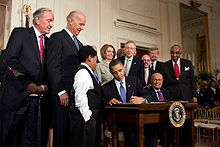 Obama signs the Patient Protection and Affordable Care Act at the White House, March 23, 2010