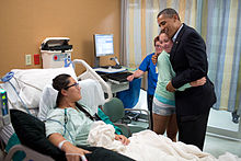 President Obama visiting shooting victims at University of Colorado Hospital on July 22, 2012