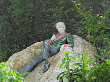 Statue of Oscar Wilde in Merrion Square, Dublin. The materials are granite, green nephrite jade, white jadeite and thulite.[2]