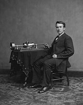 Photograph of Edison with his phonograph (2nd model), taken in Mathew Brady's Washington, DC studio in April 1878.