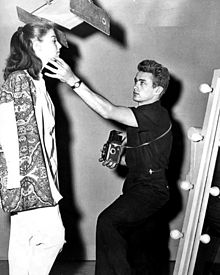 Candid of Dean posing Pier Angeli for a photo