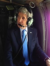 Kerry leaving the U.S. Embassy in Kabul in 2013